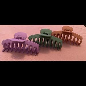 Set of three jumbo hair clips (green, lilac, and tan)